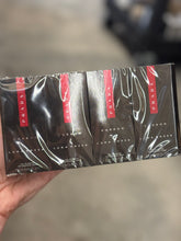 Load image into Gallery viewer, Prada Carbon Luna Rossa EDP Eau de Parfum 12 x 1.2ml / 0.04 oz vials full sealed sleeve sample pack on blurred background - men's fresh woody aromatic fragrance
